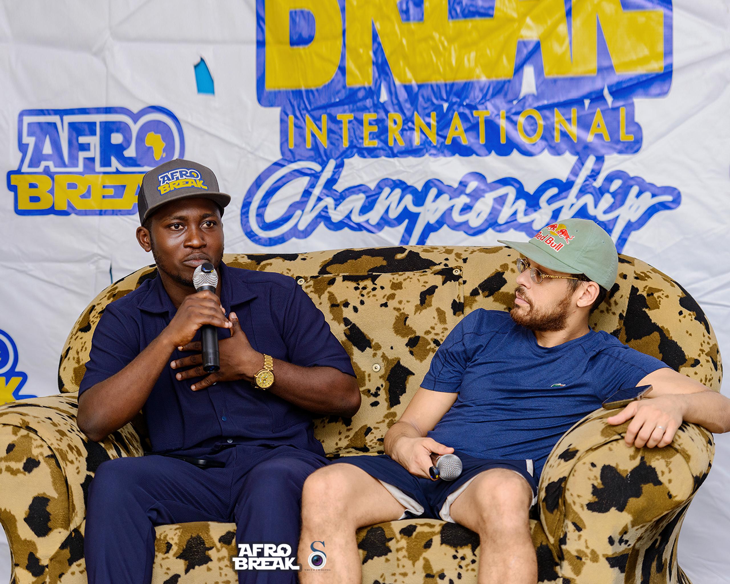 Bboy Lyricx seated with Lilou